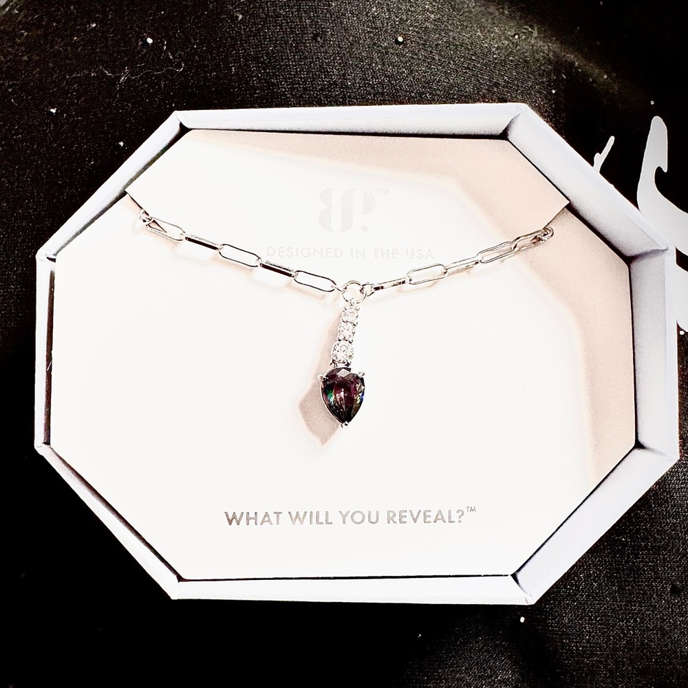 Elegant Silver Necklace with Purple Gemstone